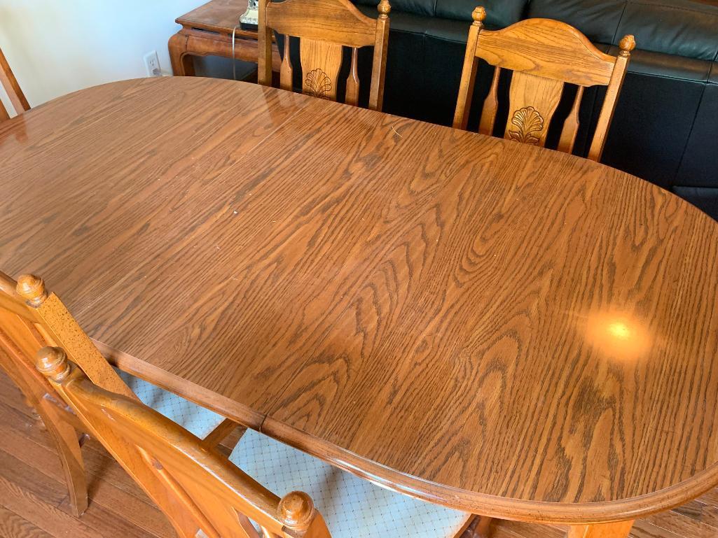 Dining Room Table & 6 Chairs (2 Captain). the Table is 29" T x 69" W x 37" D (Without Leaf)