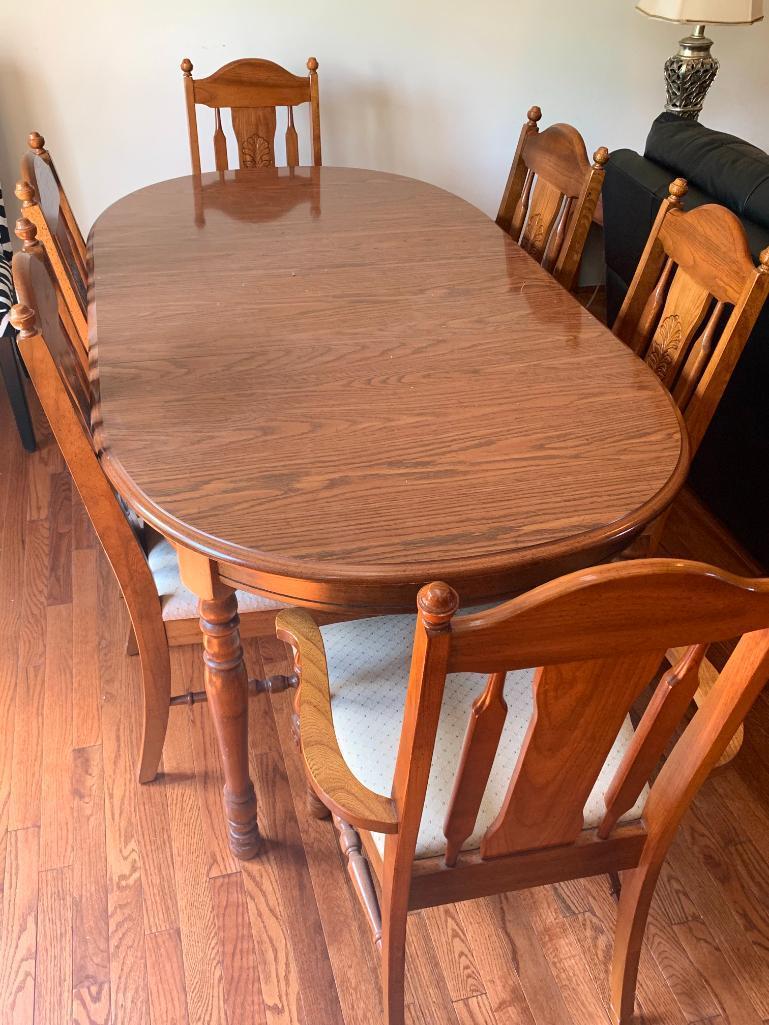 Dining Room Table & 6 Chairs (2 Captain). the Table is 29" T x 69" W x 37" D (Without Leaf)