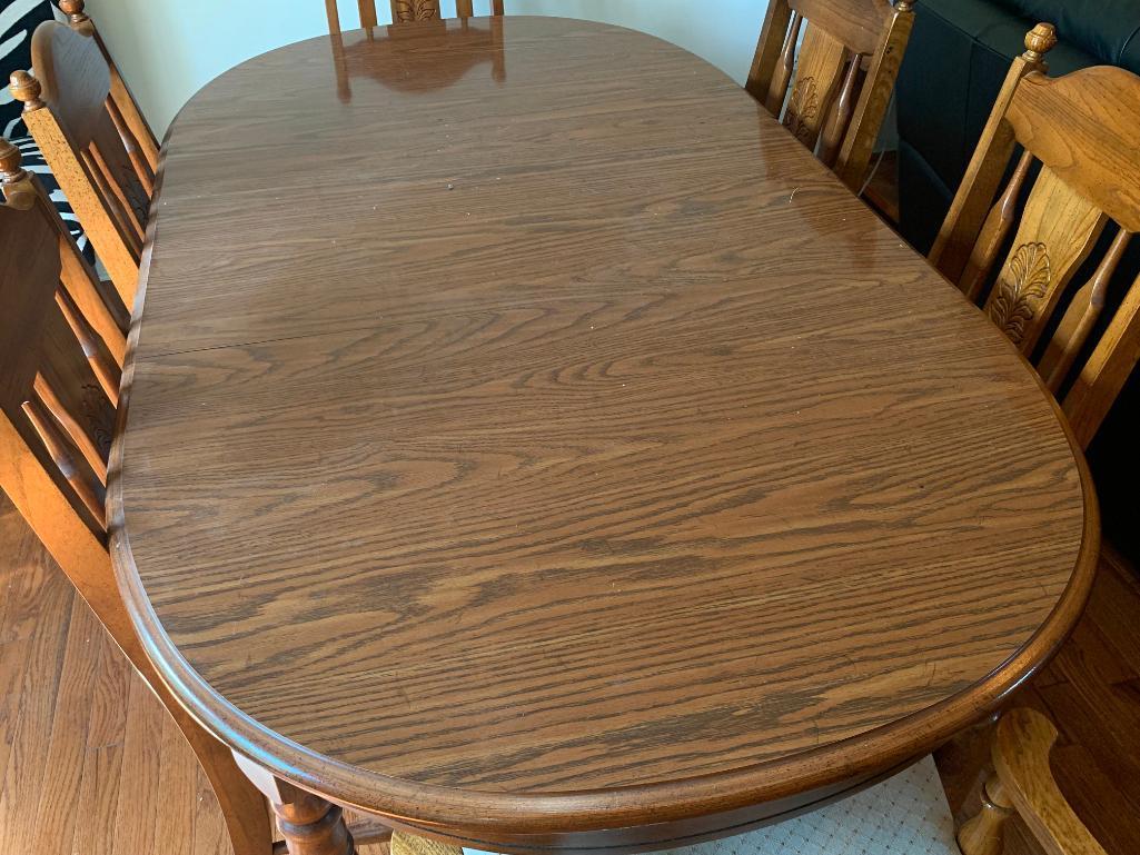 Dining Room Table & 6 Chairs (2 Captain). the Table is 29" T x 69" W x 37" D (Without Leaf)