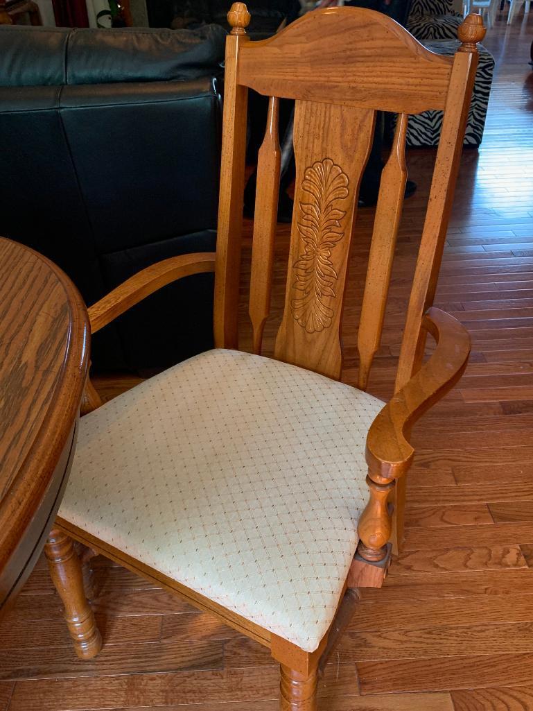 Dining Room Table & 6 Chairs (2 Captain). the Table is 29" T x 69" W x 37" D (Without Leaf)