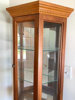 Oak Curio Cabinet w/Lights & 4 Glass Shelves by Palaski Furniture. This is 71" T x 19" W