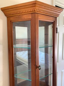 Oak Curio Cabinet w/Lights & 4 Glass Shelves by Palaski Furniture. This is 71" T x 19" W