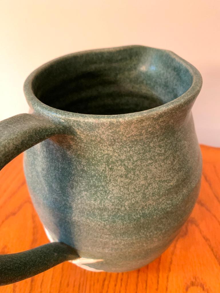 8" Studio Pottery Pitcher w/Daisy Detail. - As Pictured