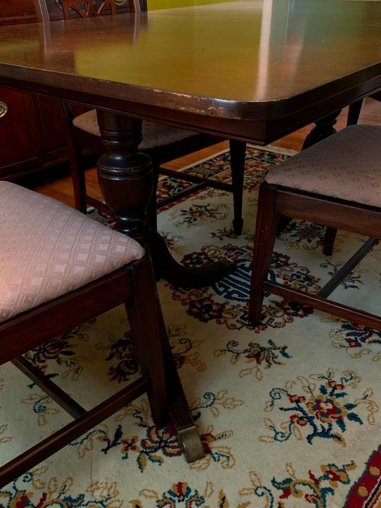 Dining Room Set w/Leaf & 4 Chairs. The Table is 30" T x 60" L x 40" W (without leaf) - As Pictured