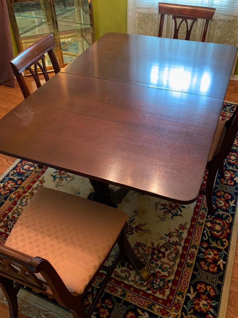 Dining Room Set w/Leaf & 4 Chairs. The Table is 30" T x 60" L x 40" W (without leaf) - As Pictured