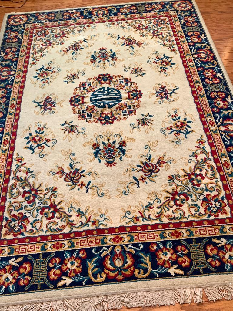 Oriental Rug by Arak . This is 67" x 95" - As Pictured