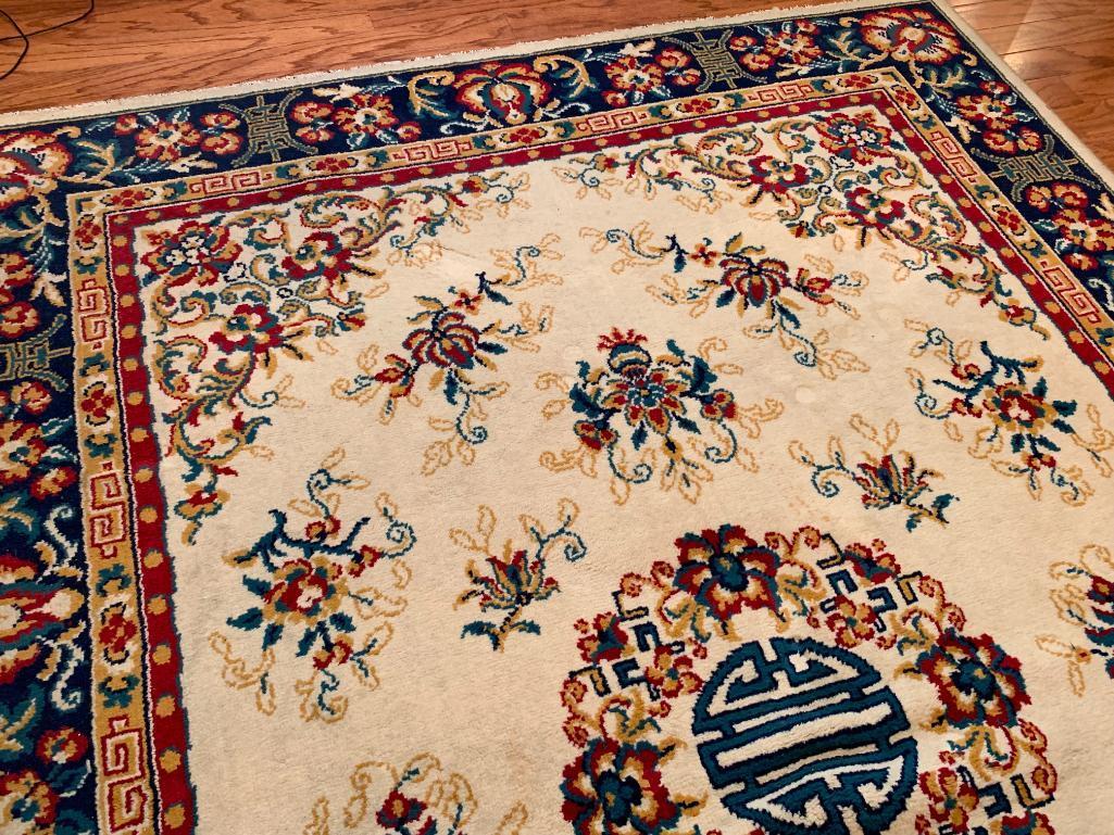 Oriental Rug by Arak . This is 67" x 95" - As Pictured