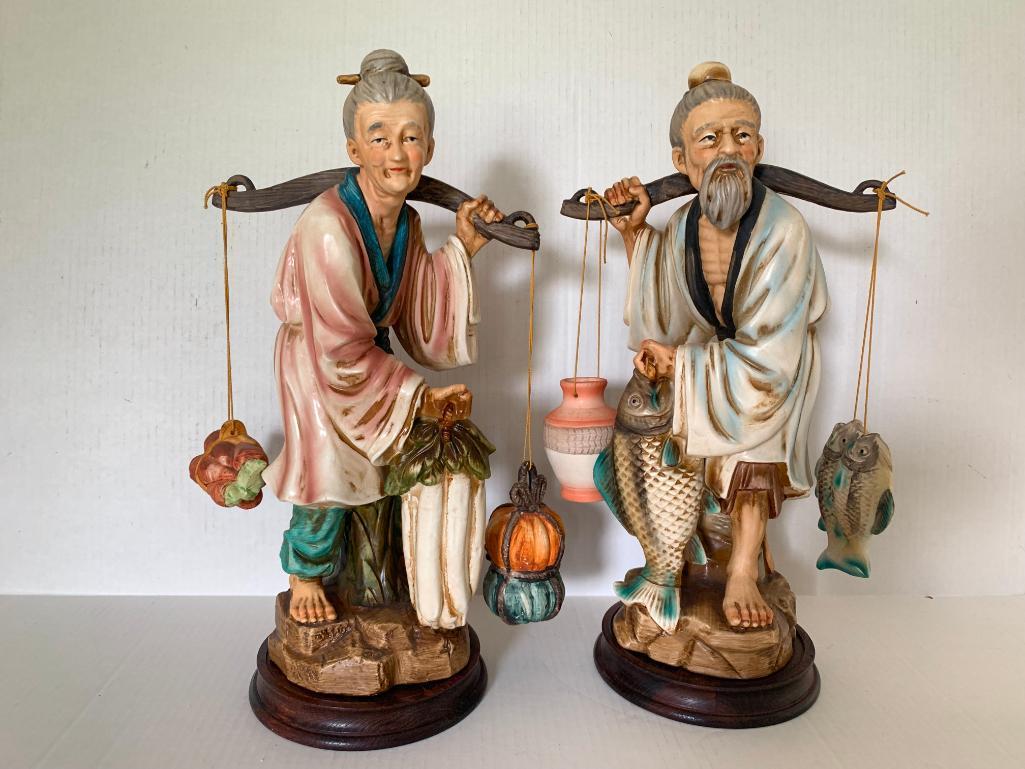 Porcelain Oriental Man & Woman Statues. They are 15" Tall - As Pictured