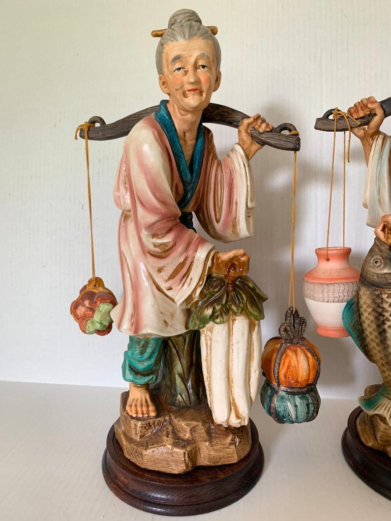 Porcelain Oriental Man & Woman Statues. They are 15" Tall - As Pictured