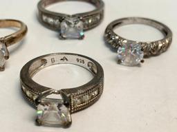Set of 4 Ladies Rings 925 Silver. WT = 13.8 grams