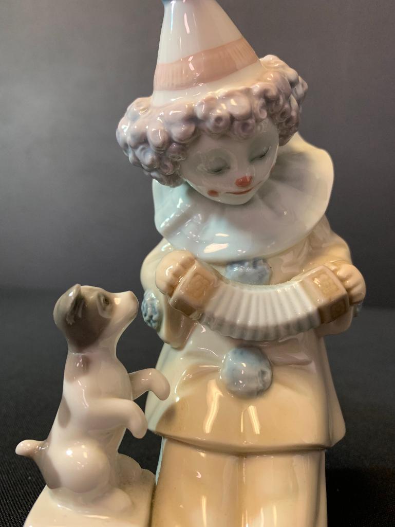 Lladro "Pierrot Playing Concertina" w/Puppy Porcelain Figurine. This is 6" Tall