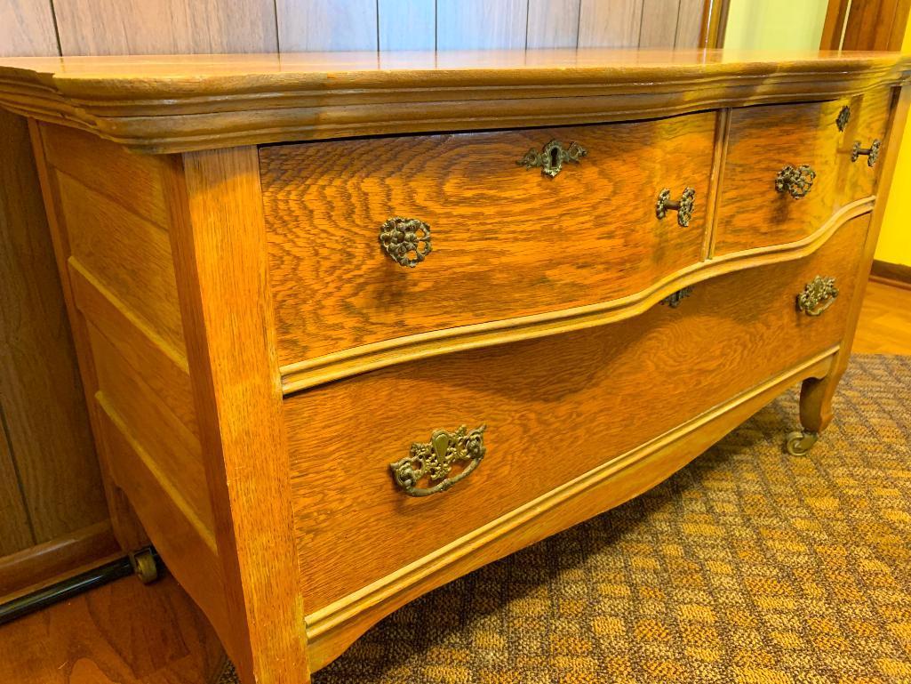 3 Drawer Antique Oak Serpentine Front Low Boy Dresser on Casters. This is 25" T x 44" W x 20" D