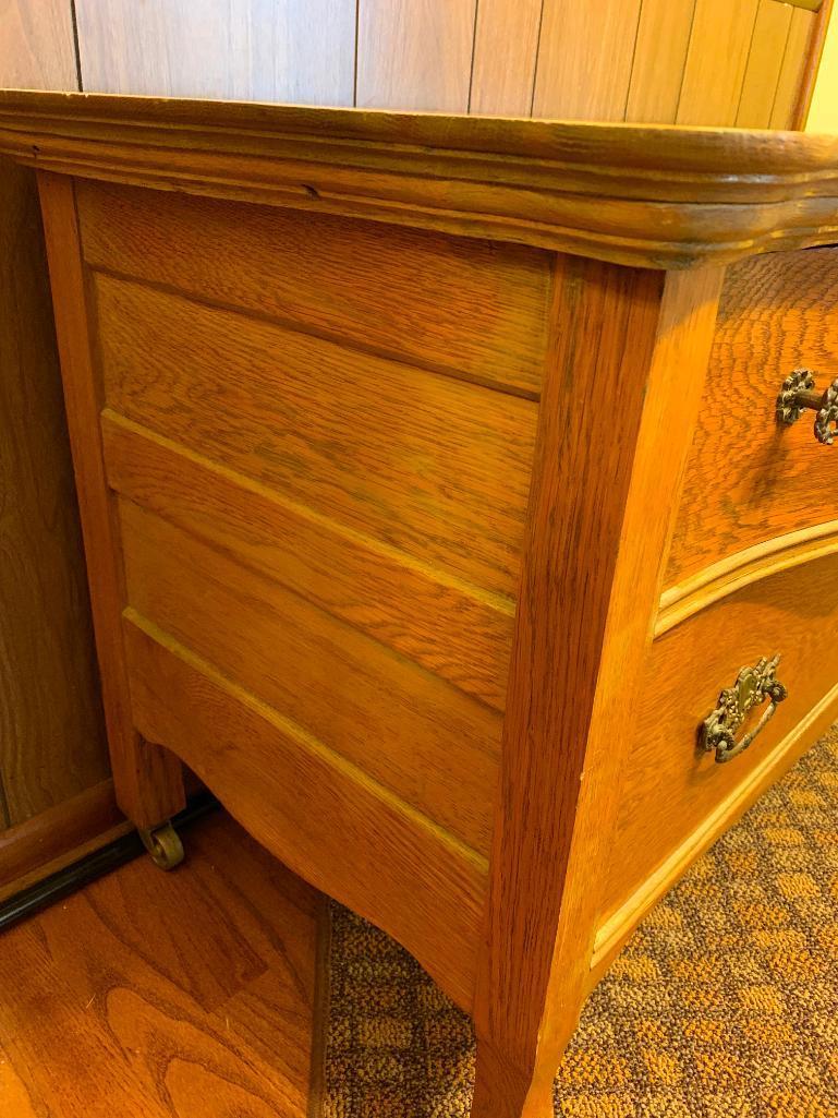 3 Drawer Antique Oak Serpentine Front Low Boy Dresser on Casters. This is 25" T x 44" W x 20" D