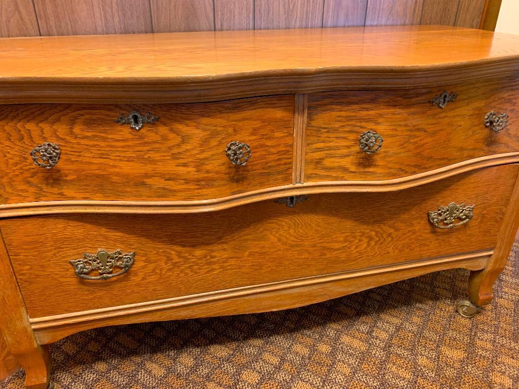 3 Drawer Antique Oak Serpentine Front Low Boy Dresser on Casters. This is 25" T x 44" W x 20" D