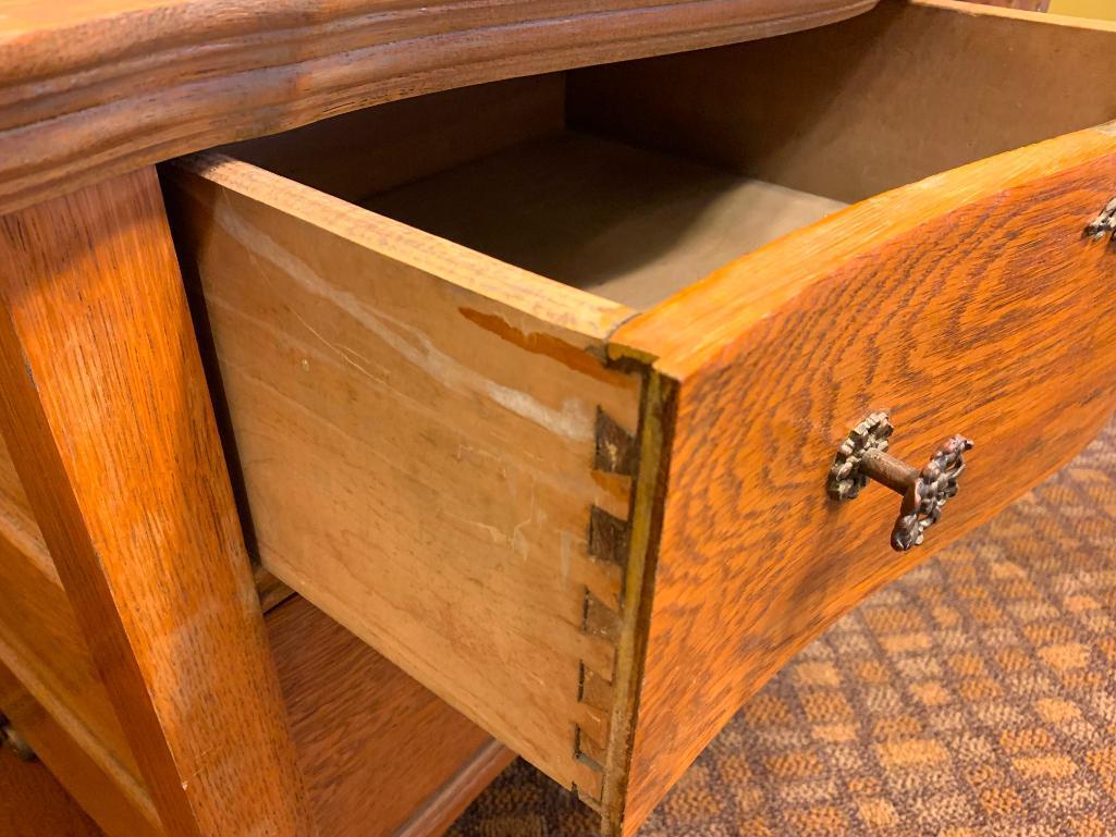 3 Drawer Antique Oak Serpentine Front Low Boy Dresser on Casters. This is 25" T x 44" W x 20" D