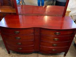 8 Drawer Dresser w/Mirror. This is 34" T x 56" W x 20" D. Has Scuffs & Scratches from Use