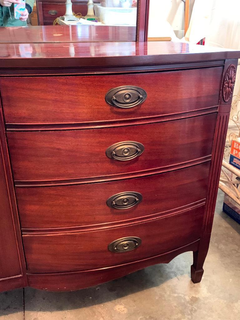 8 Drawer Dresser w/Mirror. This is 34" T x 56" W x 20" D. Has Scuffs & Scratches from Use
