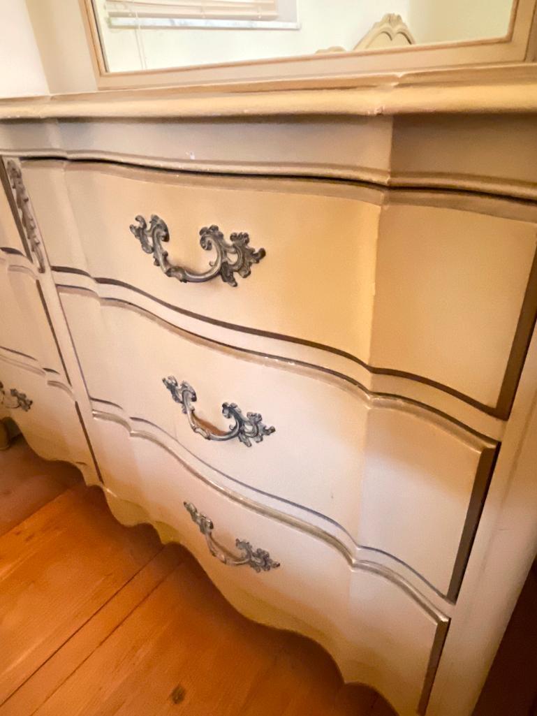 Dresser w/6 Drawers & Mirror. This is 36" T x 53" W x 21" D. This Does Have Scrapes and Scuffs