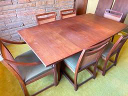 Mid Century Modern Walnut Dining Table Incl 2 Leafs & 6 Chairs. The Table is 28" T x 72" W x 42" D