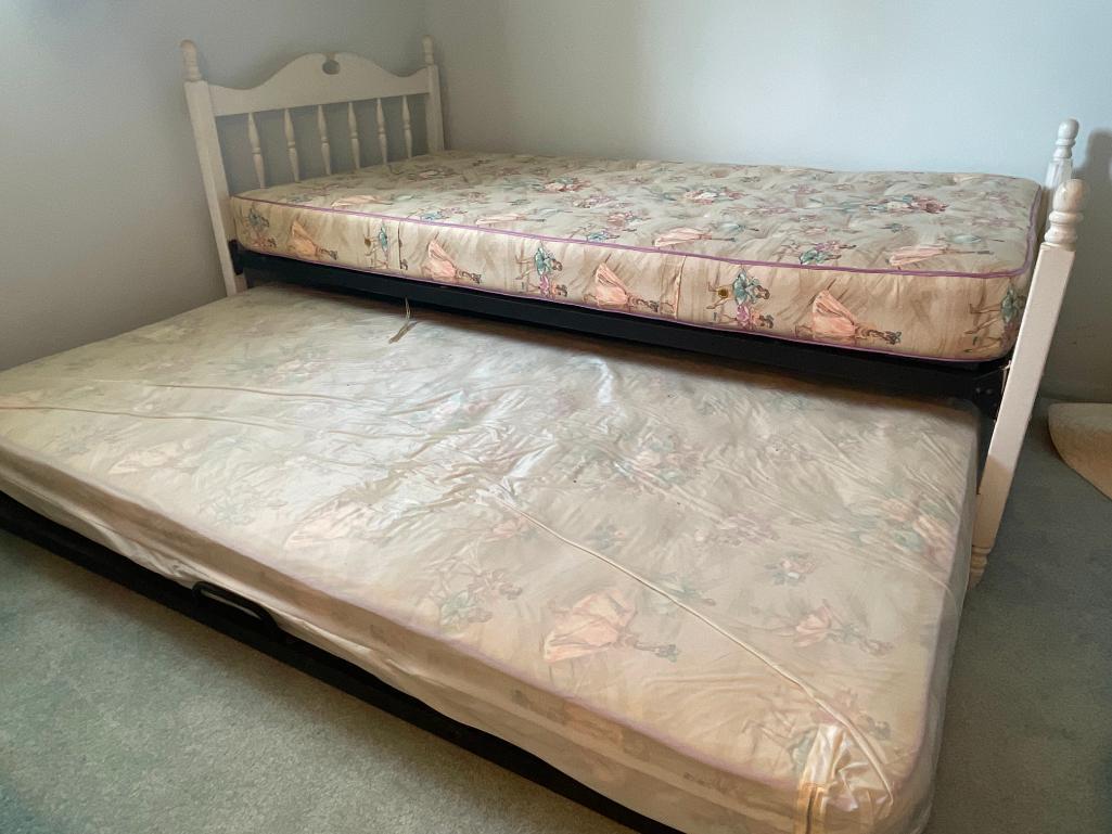 Twin Bedframe w/Trundle Incl Headboard, Footboard & Mattresses. The Mattresses are Older but Clean