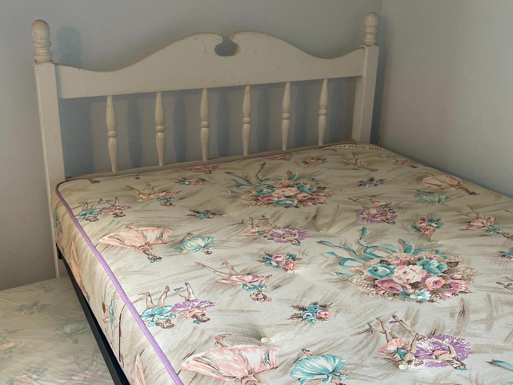 Twin Bedframe w/Trundle Incl Headboard, Footboard & Mattresses. The Mattresses are Older but Clean