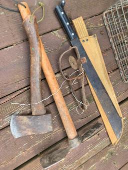 Machete, Varmet Trap and Axes as Pictured