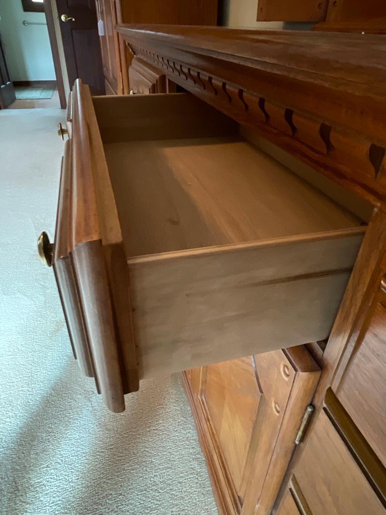 9 Drawer, Oak Dresser w/Mirror. This is 33" T x 70" W x 19" D