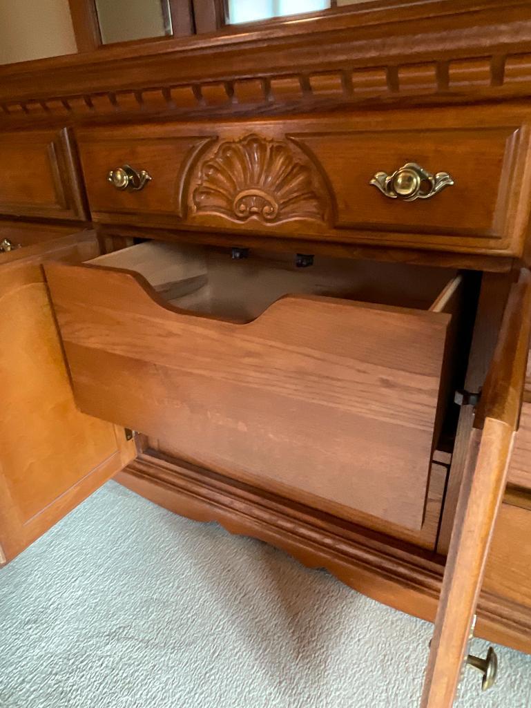 9 Drawer, Oak Dresser w/Mirror. This is 33" T x 70" W x 19" D