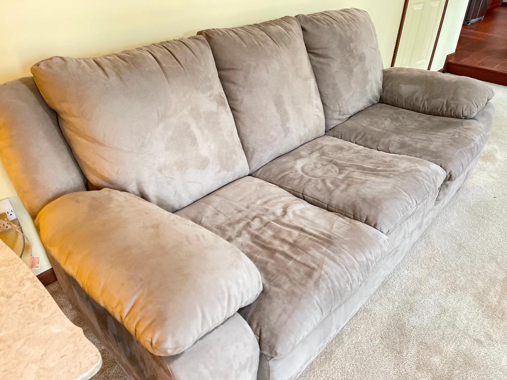 Light Tan Microfiber Sofa. Very Good Condition. This is 32" T x 85" W x 36" D