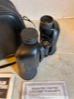 Pair of Simmons Binoculars with Case and Missing one of the Lense Covers