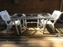 Metal/Glass Table and Plastic Chair Patio Set