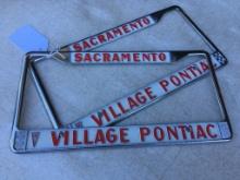Pair of License Plate Holders "Sacramento Village Pontiac"