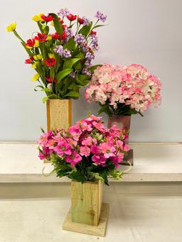 Group of Artificial Flowers in Wooden Bases