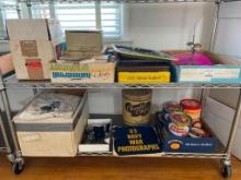 Two Shelf Lots of Misc Items Incl US Navy War Photos, CD Player, Linens, Drinking Glasses and More