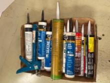 Lot of Misc Bottles of Caulk and Gun