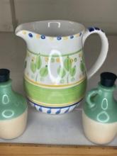 Two jugs and a water pitcher