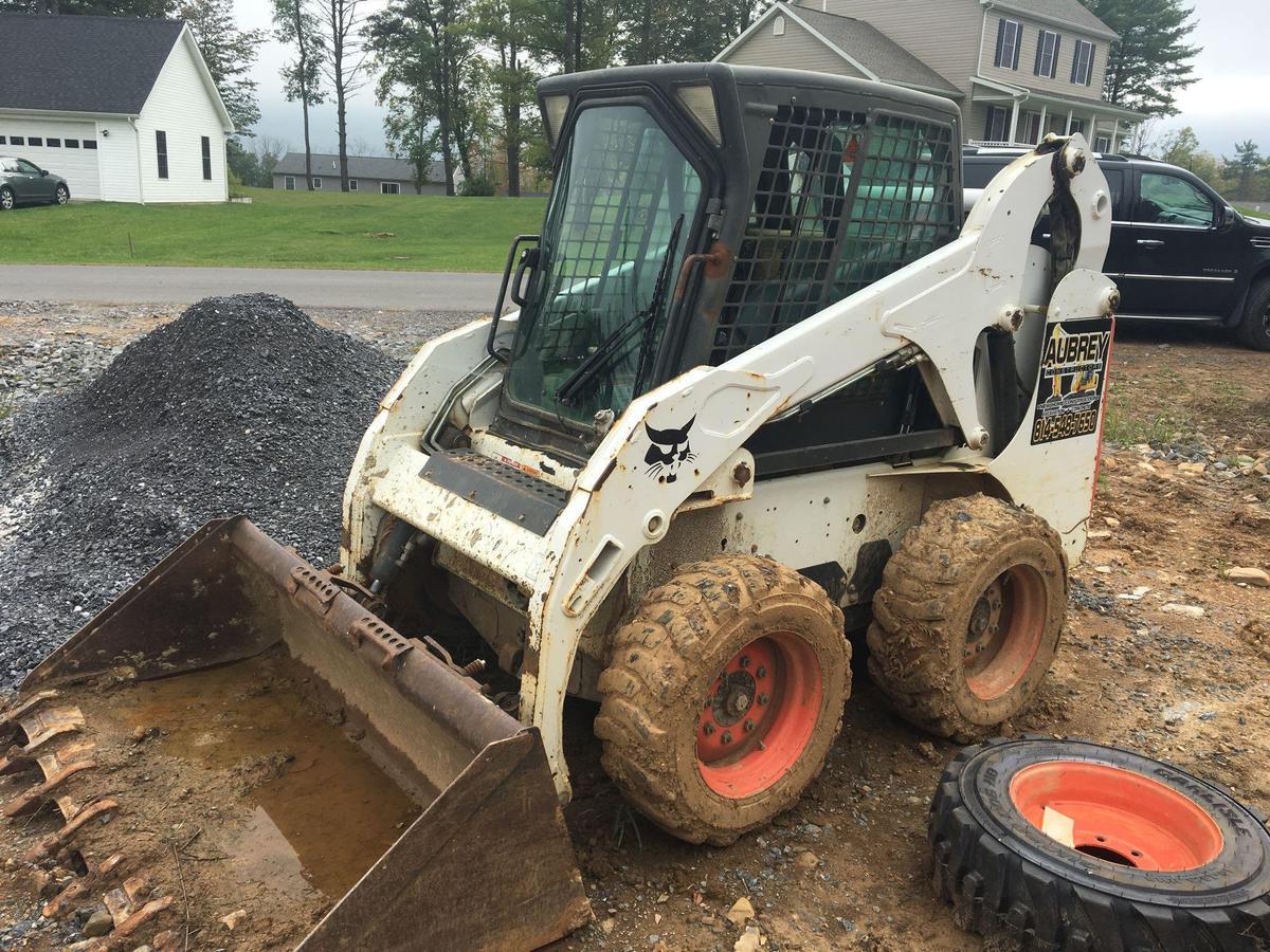 2011 BOBCAT compact skid steer loader with 2 new tires and rims (model S175) (see video)