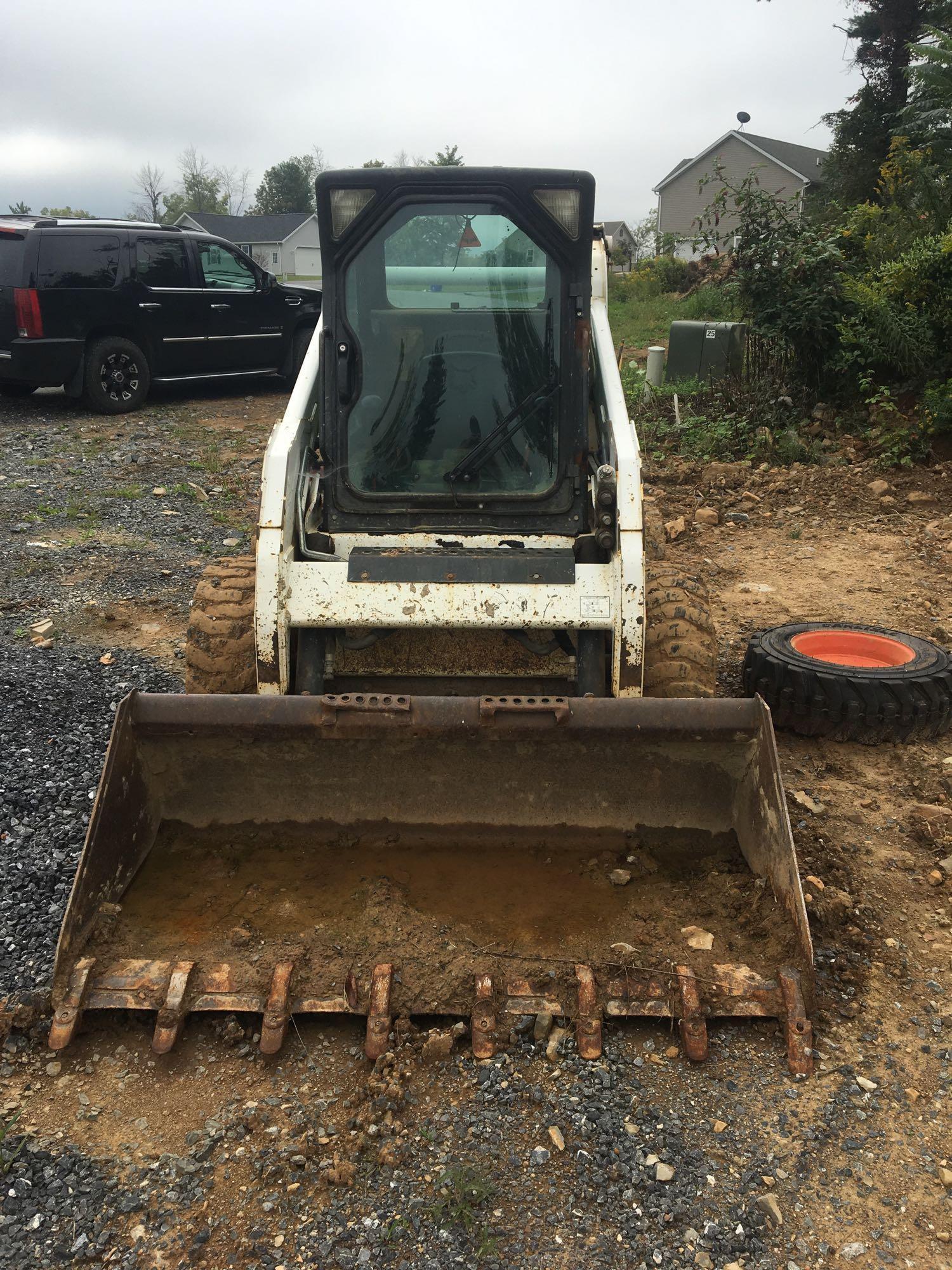 2011 BOBCAT compact skid steer loader with 2 new tires and rims (model S175) (see video)