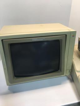 Vintage APPLE IIe computer (keyboard, monitor, external drive)