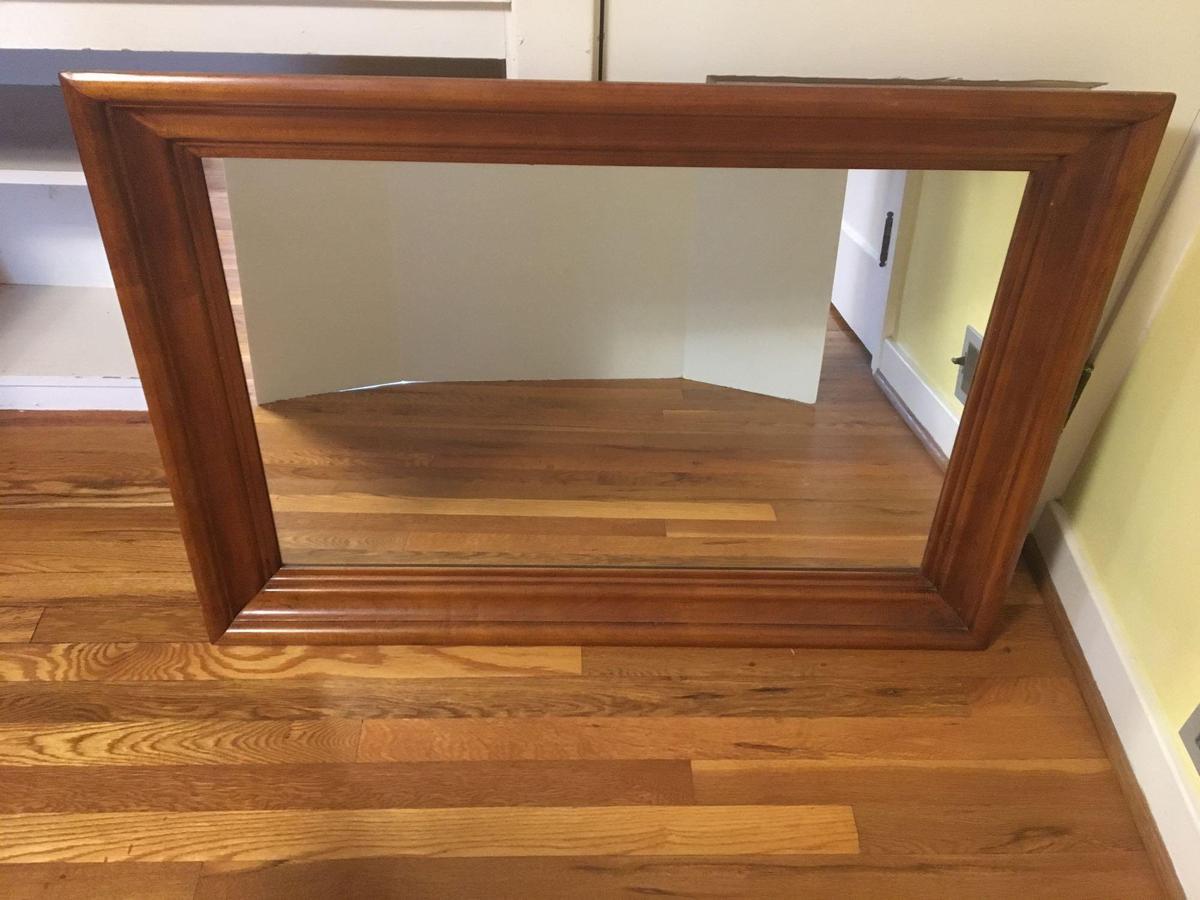 Wood framed wall mirror