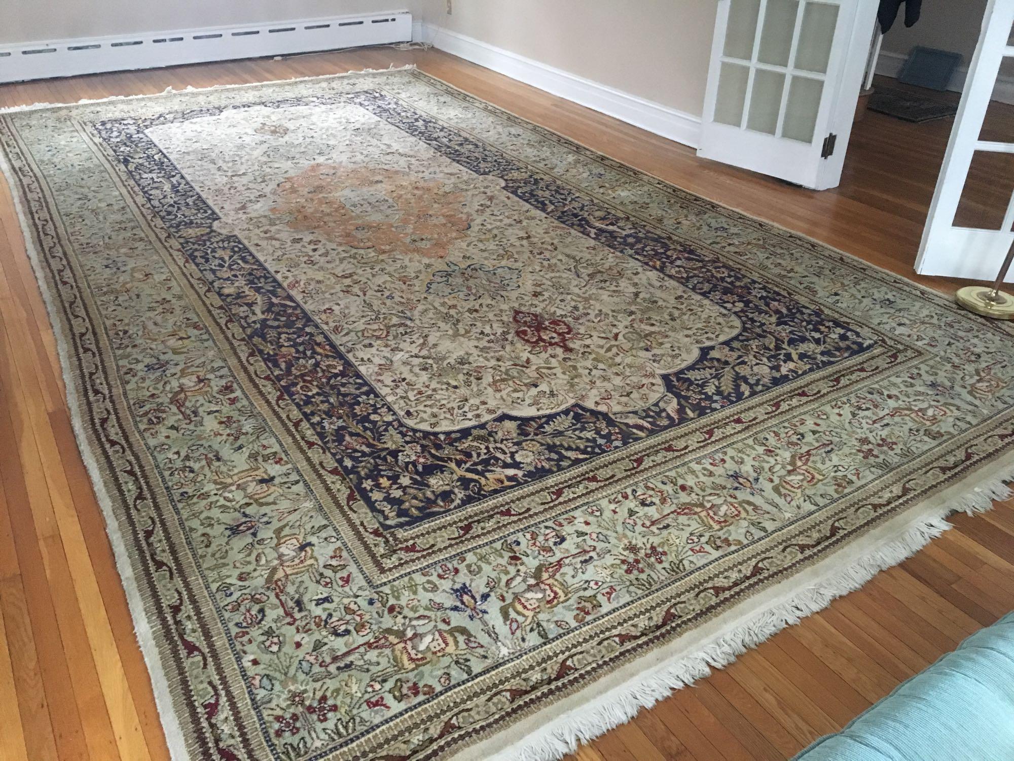 Area rug (10'x18'7")/backing pad