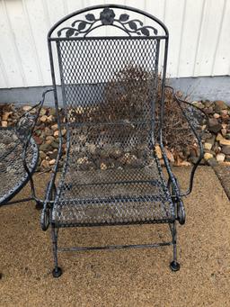 2- wrought iron chairs and table
