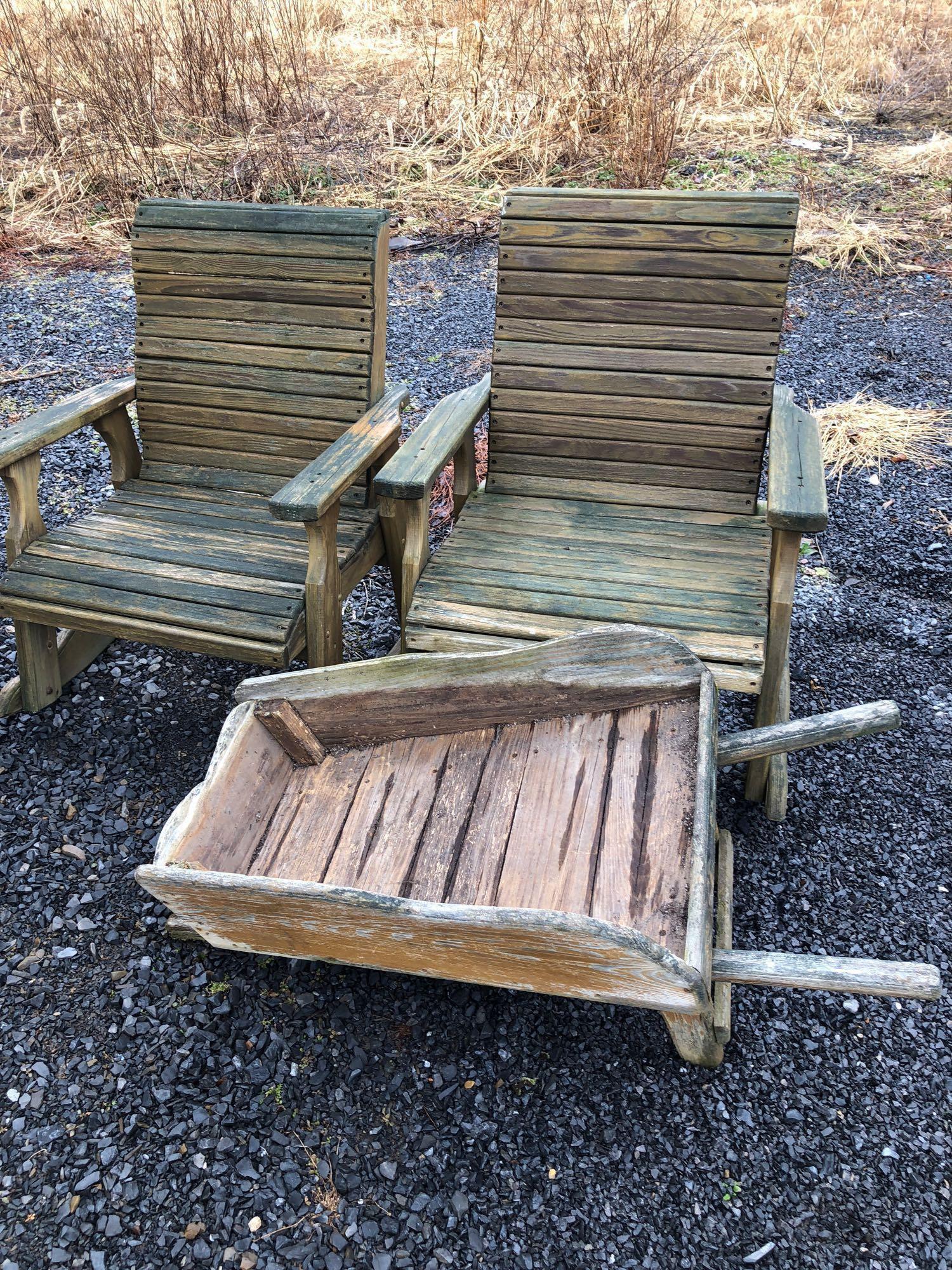 2 wooden outdoor rocking chairs,wooden decorative outdoor wheel barrel(needs front tire)