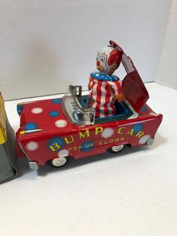 Vintage tin/litho BUMP CAR /Pop Up Clown with original box