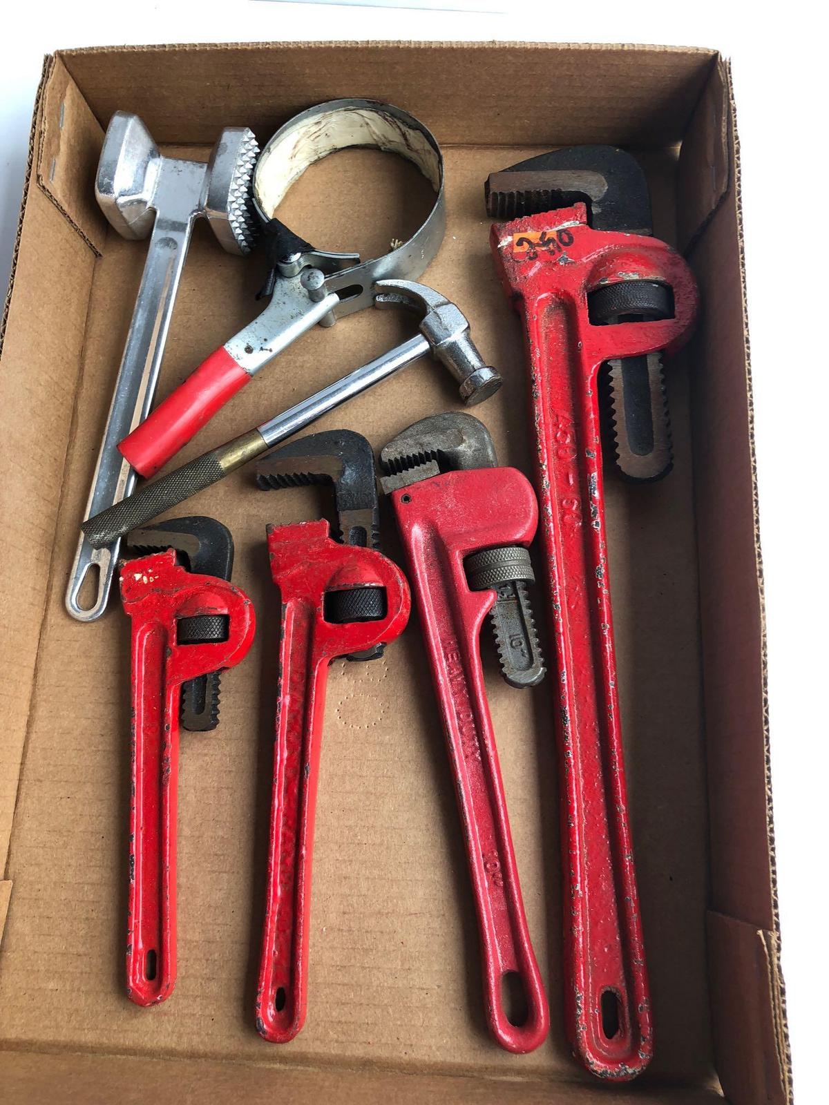 Pipe wrenches, small brass handle hammer, oil filter wrench, more