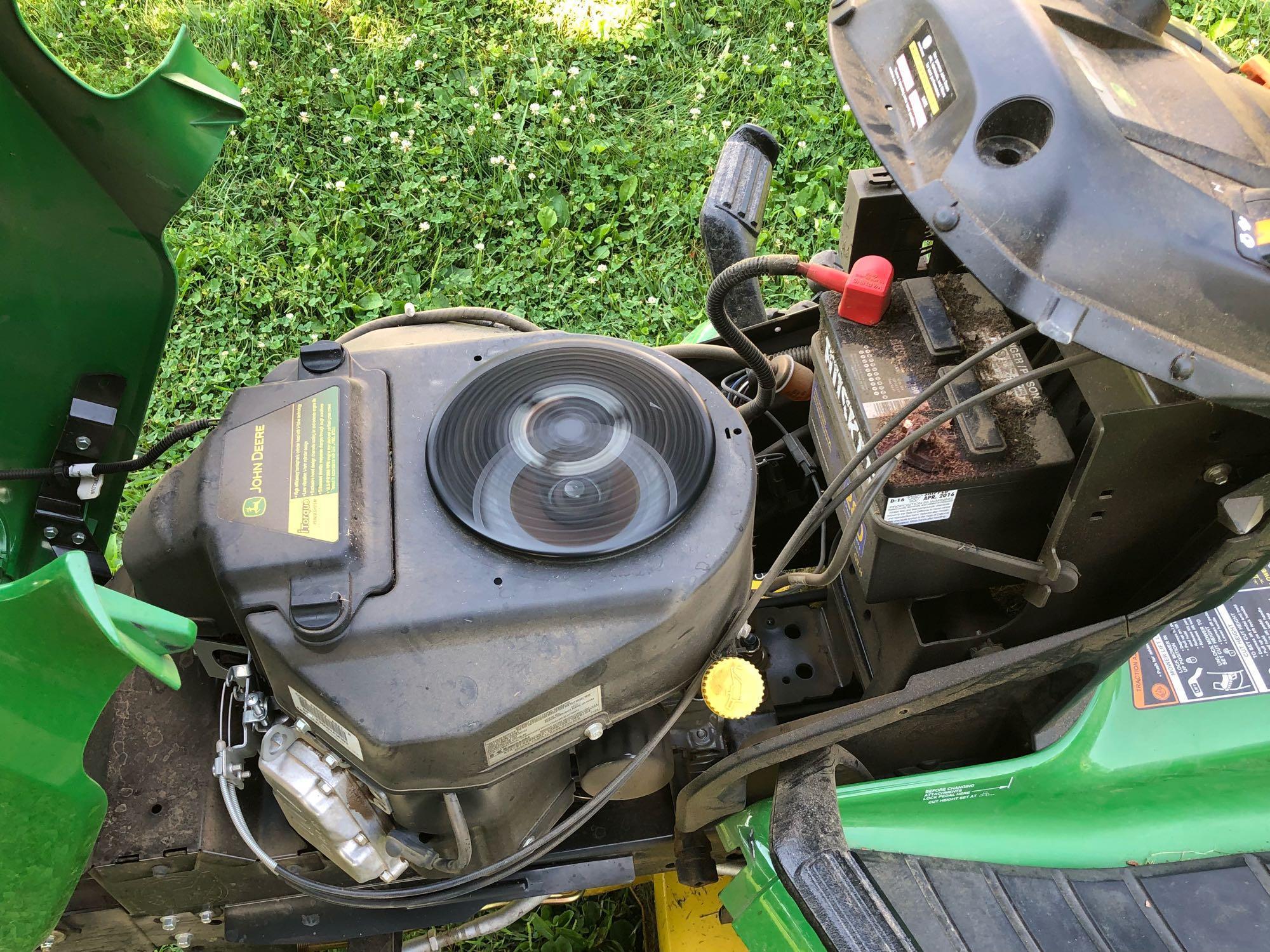 JOHN DEERE(X300) lawn tractor/42" mower deck in running condition showing only 172 hours of run time