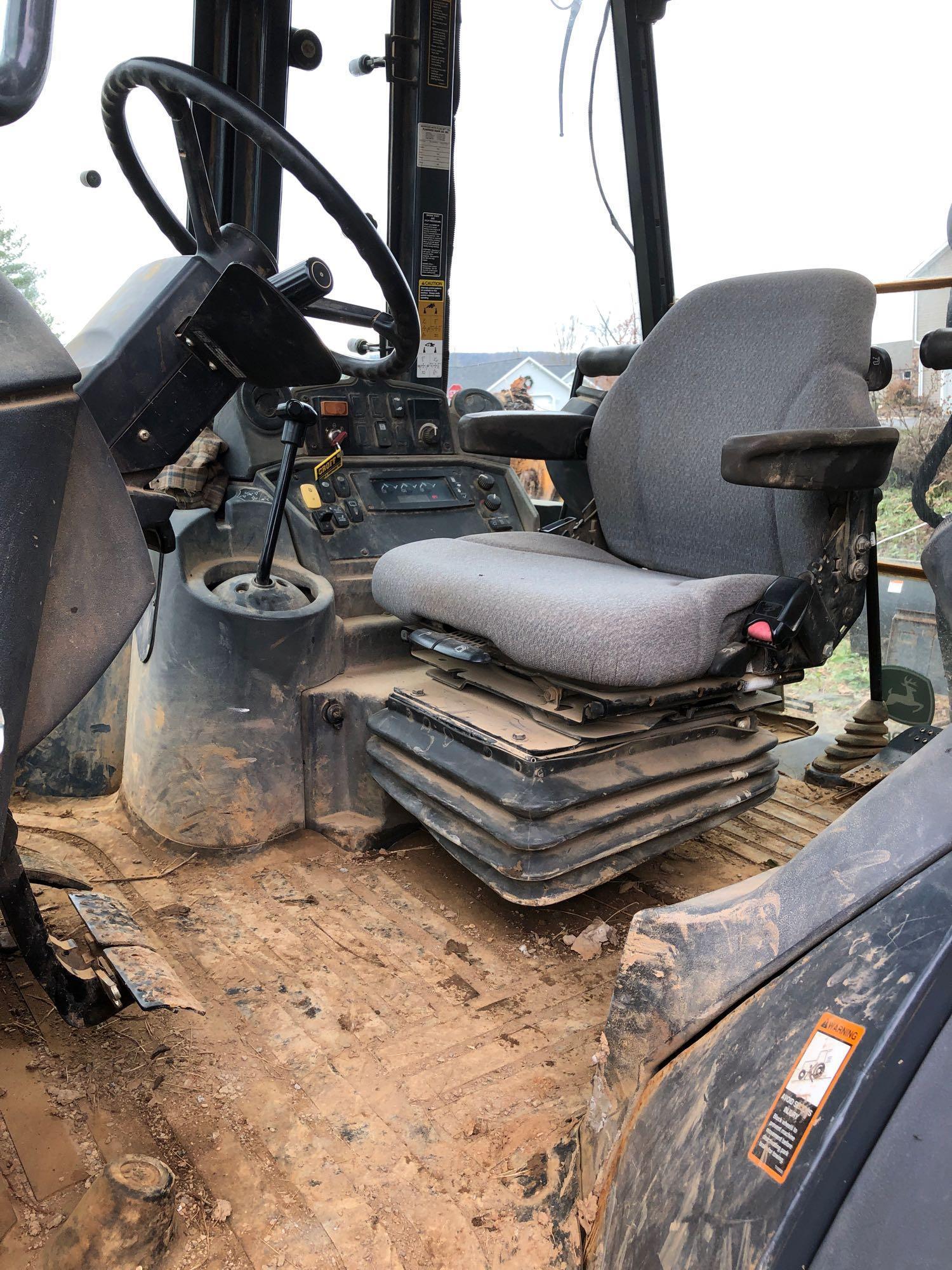 JOHN DEERE(310sj)backhoe/loader(4x4 diesel;extend-A-hoe;plumbed for hammer;sawtooth boom;cab heat/AC