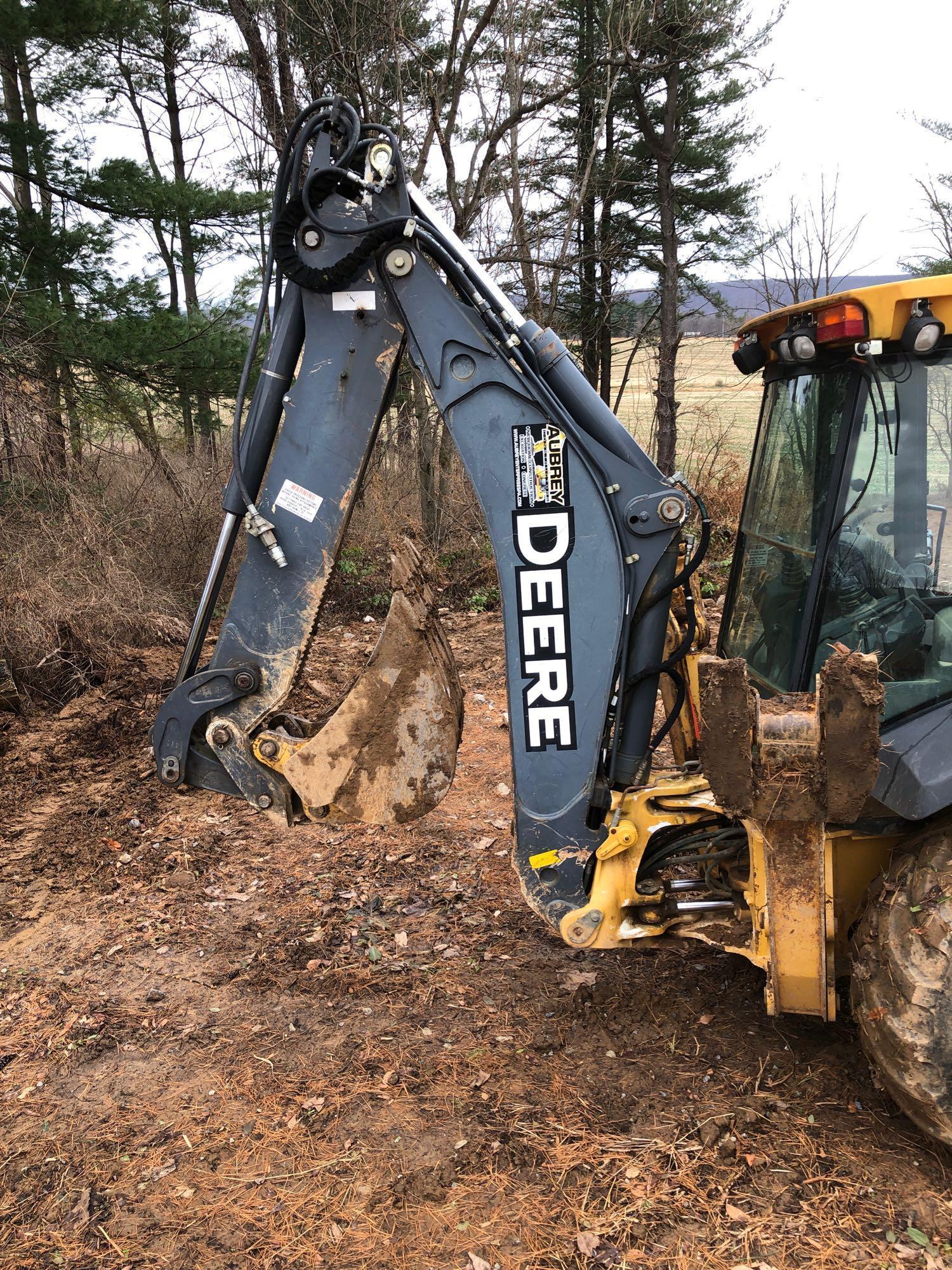 JOHN DEERE(310sj)backhoe/loader(4x4 diesel;extend-A-hoe;plumbed for hammer;sawtooth boom;cab heat/AC