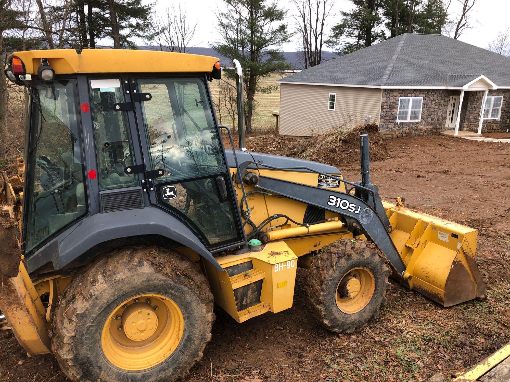 JOHN DEERE(310sj)backhoe/loader(4x4 diesel;extend-A-hoe;plumbed for hammer;sawtooth boom;cab heat/AC