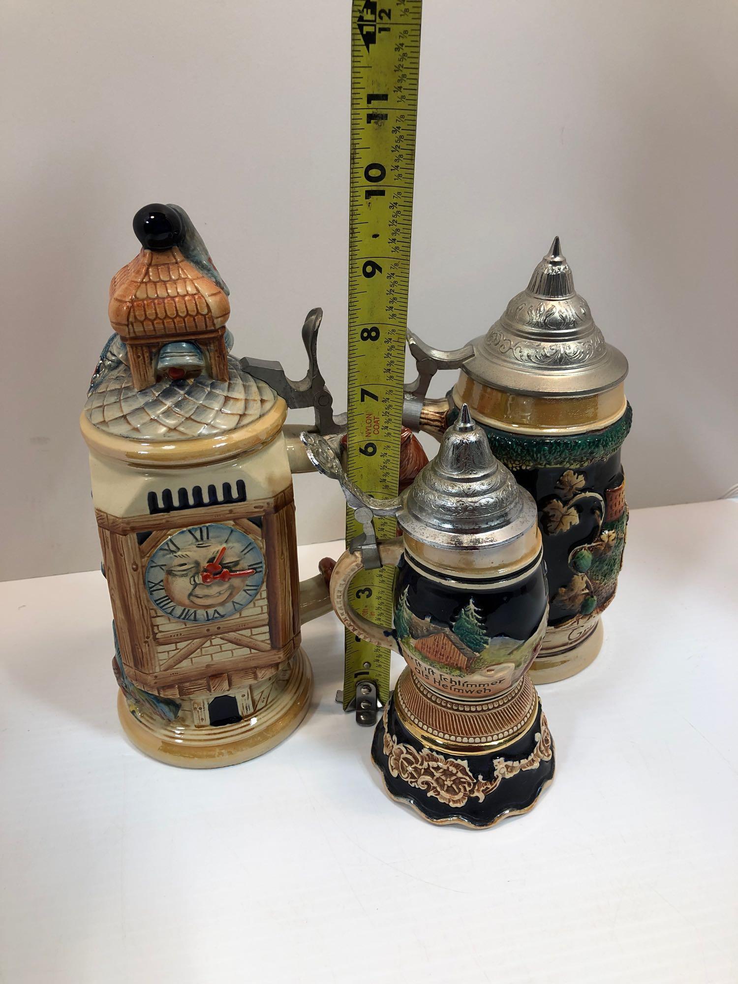 3- vintage German beer steins(small one is musical)